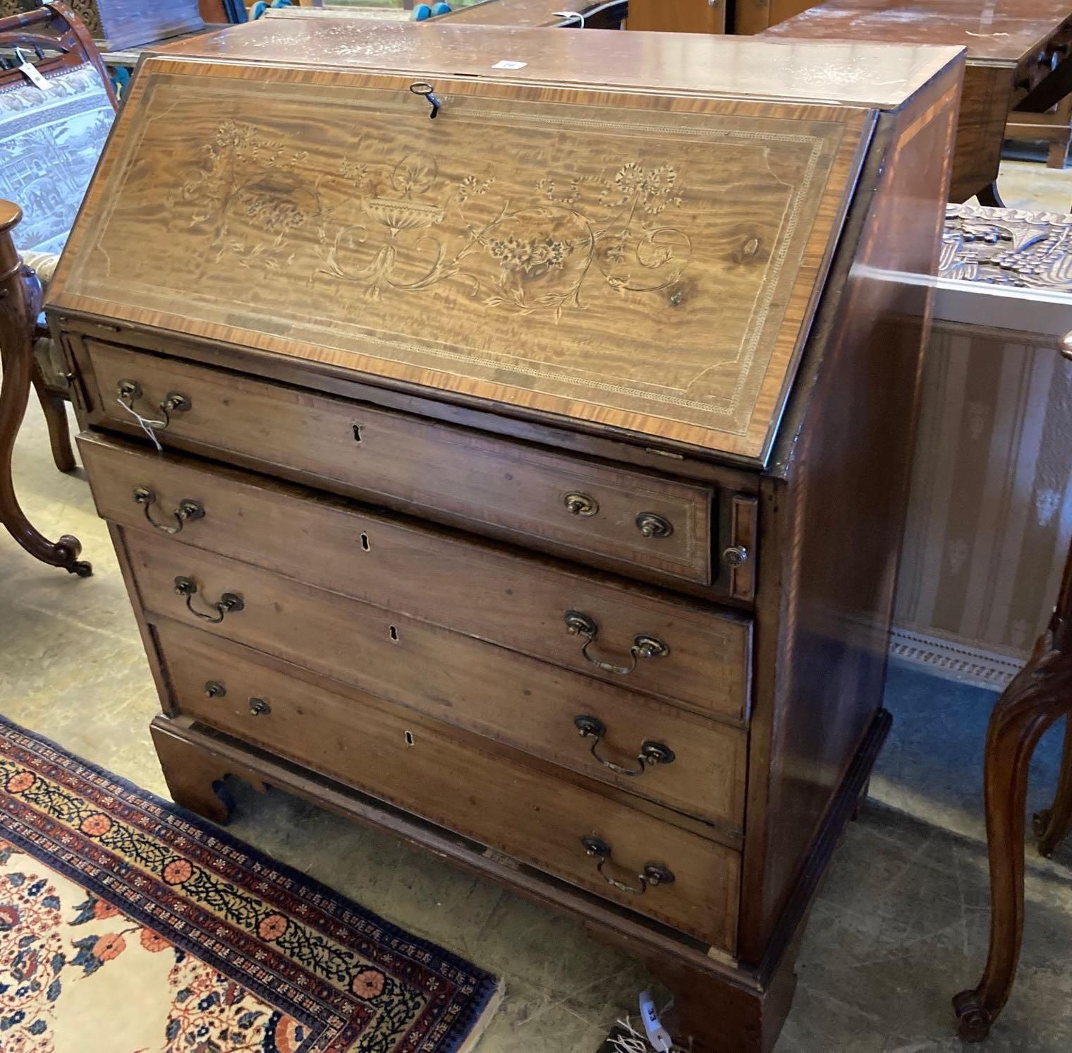 An Edwardian marquetry inlaid mahogany bureau, width 92cm